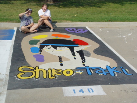 Emily & Courtlyn Painting their parking space