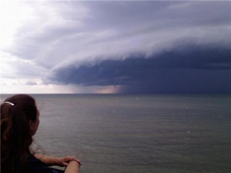 watching a thunderstorm move in over the lake