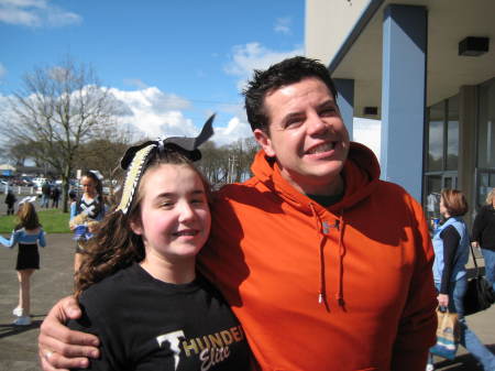 Sam and her Uncle Will at a cheer competition