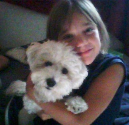 My grand daughter Marilyn with my Bichon bolognese "Beauty"