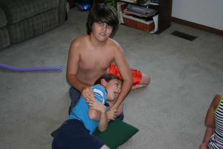 My middle son (charlie) wrestling his step bro