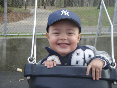 Alex loves the swings