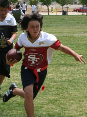 Our football star running for a touchdown!