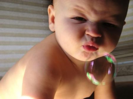 trent blowing at bubbles