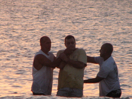 Scott and Pastor Danny baptizing George