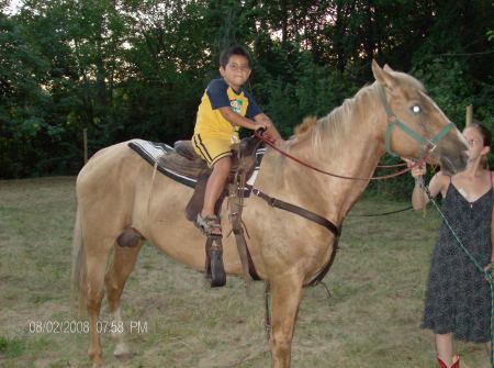 My son Derrick and our horse lily