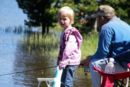 Megan and her dad fishing