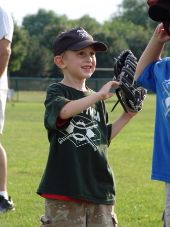 My youngest slugger Kai, born in 2003