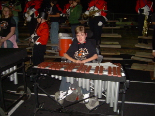 Jordan (15 yrs) playing at a football game