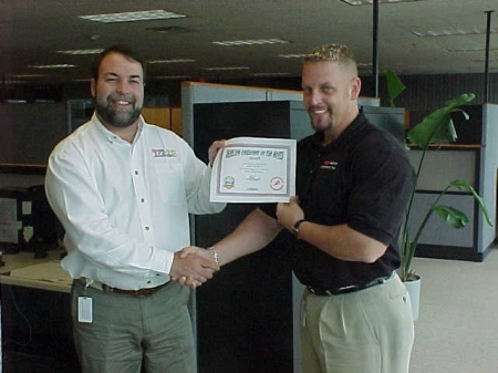 Bob presenting award at work...