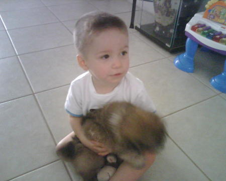 My baby with his new puppy.