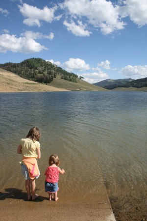 Girls putting their toes in the COLD water!