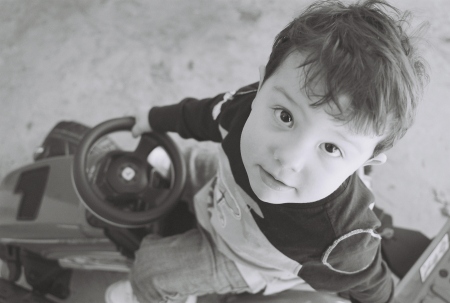 My nephew Brett on his own tractor