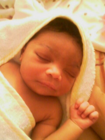 M lil girl newborn pic one day old