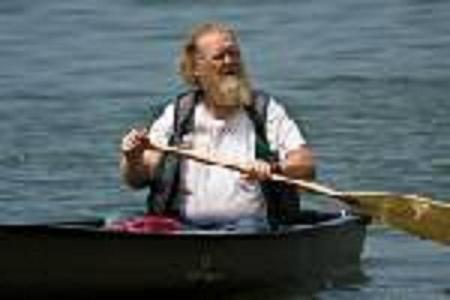 Grizzly John in canoe on Cassadaga Lake