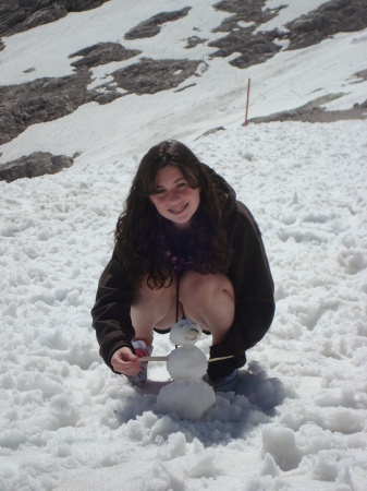 maddie makes a snowman in july