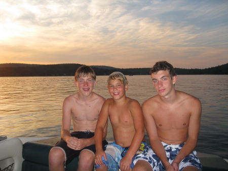 picture of the boys at sunset on the lake