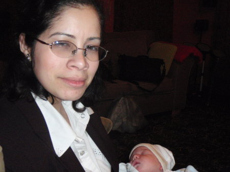 MD with my godchild - March 2010