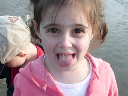 Mackenzie being silly at the beach last summer