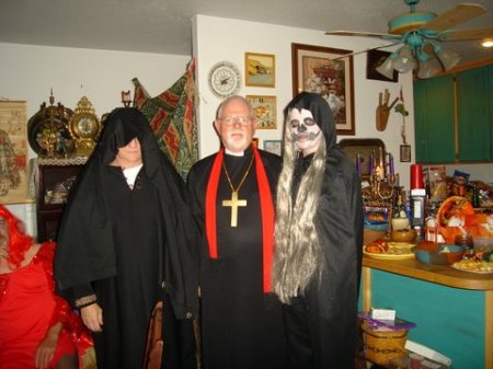 The Father counsels two ghouls.