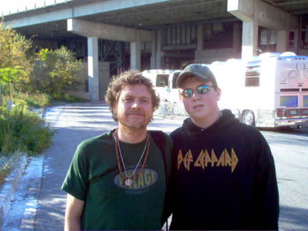 My son with Rick Allen of Def Leppard.