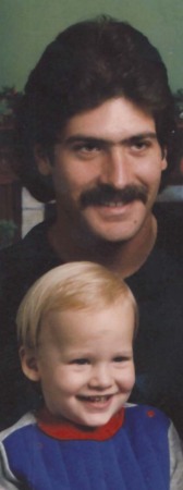 My brother Jeff & his old son Joshua Xmas 1985