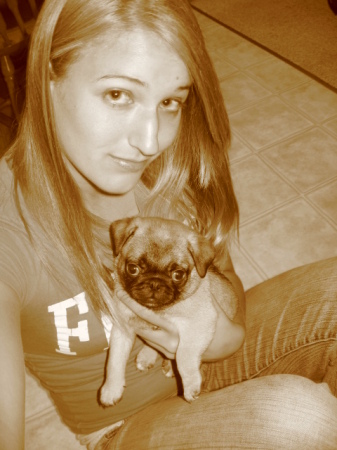 my daughter Kelsi and our pug, Roly