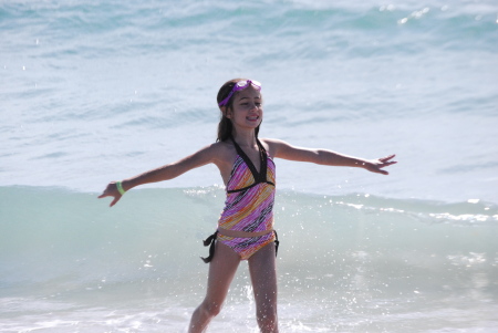 Shannon dancing in the ocean