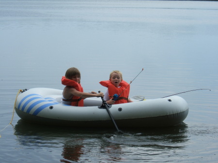 Skyler & Ayden go fishing by boat