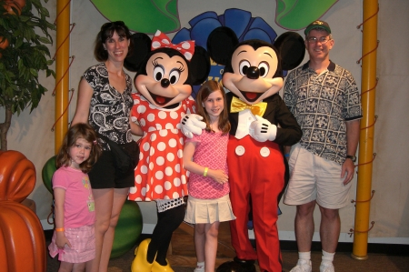 Our family with Minnie and Mickey