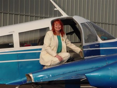 Deb on her Cessna 310 in Anchorage.