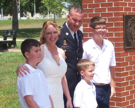 Amy, Mike, and our 3 handsome grandsons