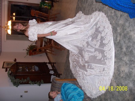 My daughter Alex in my wedding gown