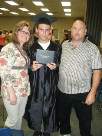 My son Ren and his mother and I at his Graduat