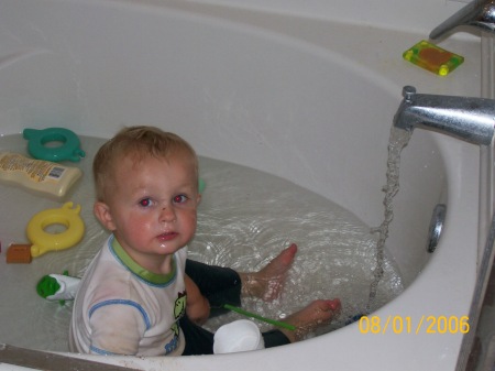 Ben in a Bath with clothes