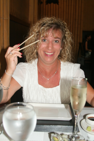 Sharon trying out chopsticks