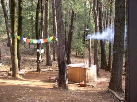 Wood burning hot tub on a chilly Fall day...