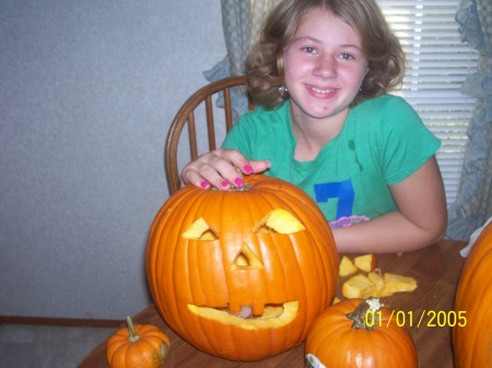 Chelea with her carved pumkin 08