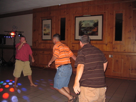 Chad Harmon, Jay Krom and Dean Demel dancing.