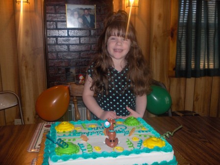 Corinne with her Scooby Doo Birthday Cake
