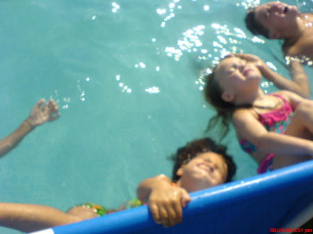 Niece, Nephew, and Great Nieces swimming
