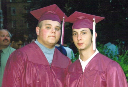 Graduation pic of Me and Q.