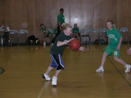 Erin playing 6th grade basketball