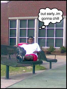 christian chillin in front of school