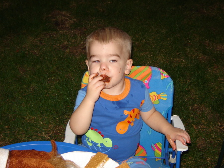 Zack munching on chocolate