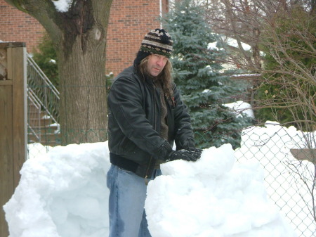 The love of my life building a snow fort