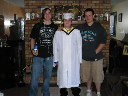 Steve's graduation day with 2 brothers
