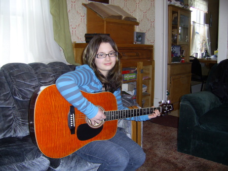 my oldest girl and her new guitar