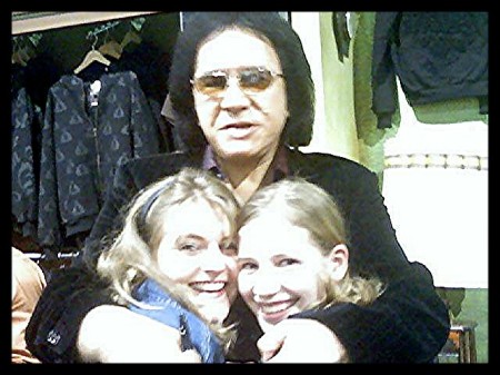 The girls getting squished by Gene Simmons
