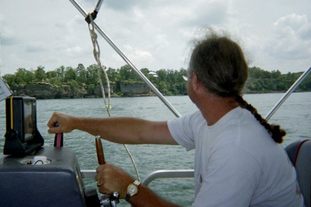 Capn Hat on his little boat.